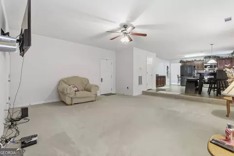 Living - 310 Megan Dr, Hampton, GA 30228 photo 4 of 5