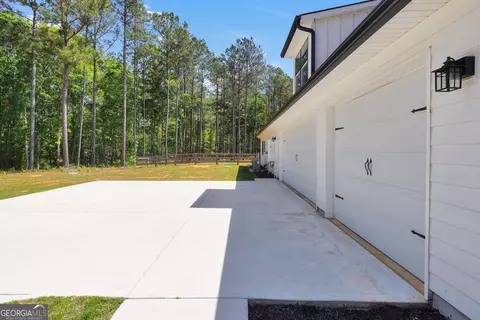 Exterior - 787 Silver Dollar Rd, Milner, GA 30257 photo 5 of 9