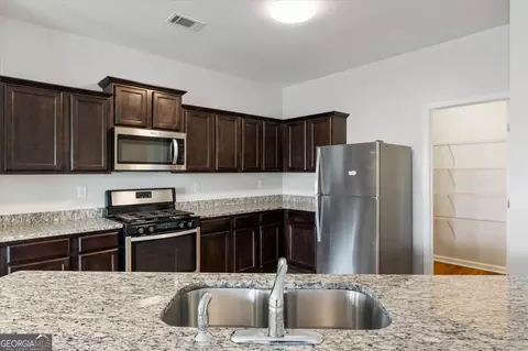 Kitchen - 703 Independence Ave, Pendergrass, GA 30567 photo 3 of 3