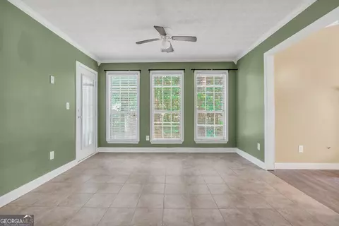 Living - 208 Drake Elm Ct, Hampton, GA 30228 photo 5 of 7