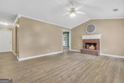 Living - 208 Drake Elm Ct, Hampton, GA 30228 photo 2 of 7