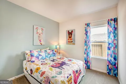 Bedroom - 1405 Trellis Ct #LOT 13, Hampton, GA 30228 photo 2 of 3