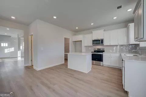 Kitchen - 207 St Annes Pl, Covington, GA 30016 photo 2 of 3
