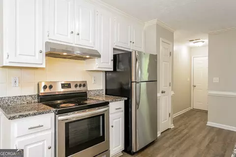 Kitchen - 125 Whispering Pine Dr, Covington, GA 30016 photo 2 of 2