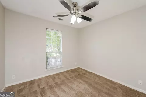 Bedroom - 125 Whispering Pine Dr, Covington, GA 30016 photo 3 of 4