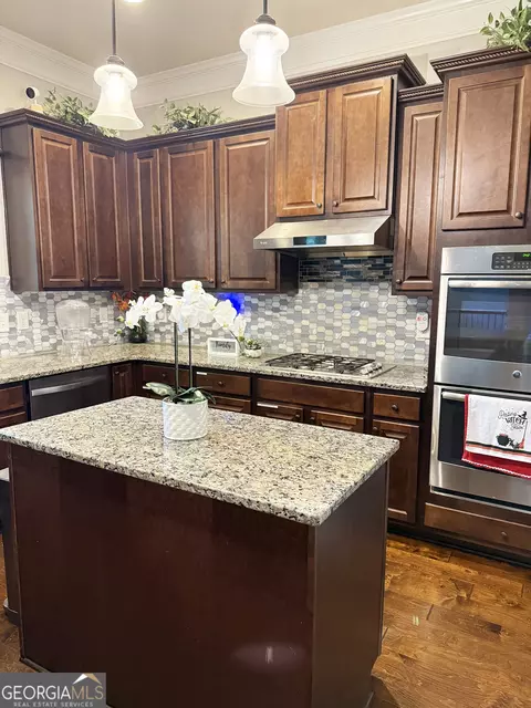 Kitchen - 1869 Schofield Dr, Hampton, GA 30228 photo 3 of 4