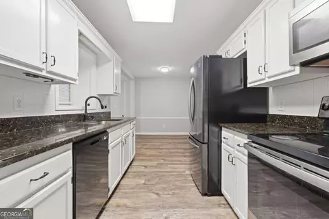 Kitchen - 135 Dunwick Ln, Mcdonough, GA 30253 photo 2 of 2