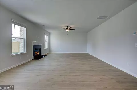 Living - 252 Chiswick Loop, Stockbridge, GA 30281 photo 2 of 5