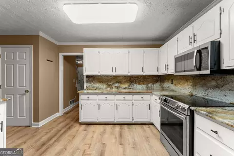 Kitchen - 1961 Cedar Bluff Rd, Monroe, GA 30656 photo 5 of 5