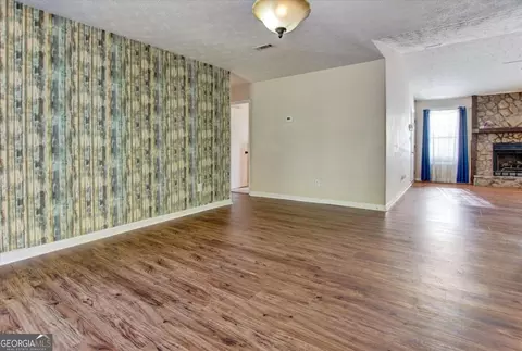 Living - 11553 Matthews Trl, Hampton, GA 30228 photo 4 of 5