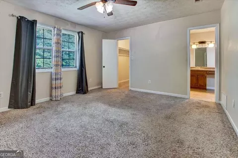 Bedroom - 11553 Matthews Trl, Hampton, GA 30228 photo 5 of 7