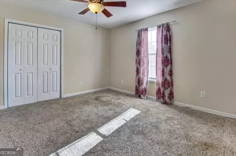 Bedroom - 11553 Matthews Trl, Hampton, GA 30228 photo 3 of 7