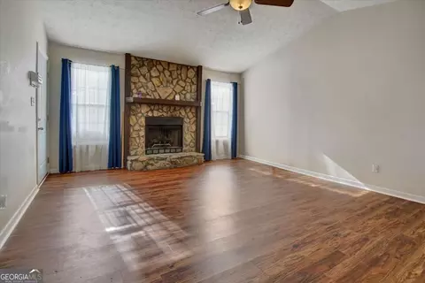 Living - 11553 Matthews Trl, Hampton, GA 30228 photo 2 of 5