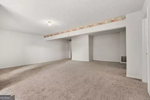 Living - 11050 Pebble Brook Ct, Hampton, GA 30228 photo 6 of 6