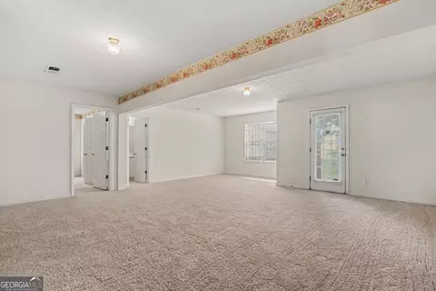 Living - 11050 Pebble Brook Ct, Hampton, GA 30228 photo 5 of 6