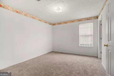 Bedroom - 11050 Pebble Brook Ct, Hampton, GA 30228 photo 6 of 6