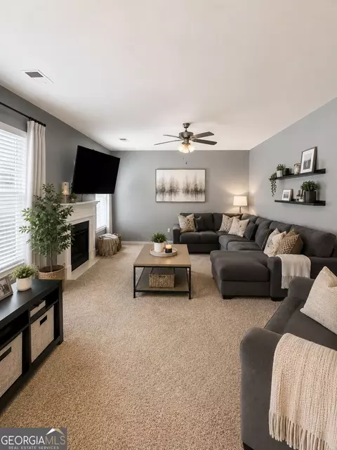 Living - 12173 Centerra Dr, Hampton, GA 30228 photo 4 of 5
