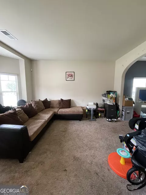 Living - 12173 Centerra Dr, Hampton, GA 30228 photo 2 of 5