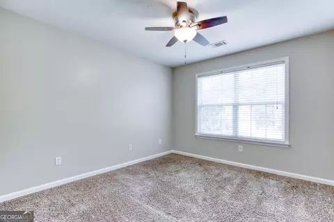 Bedroom - 1017 Panoramic Pointe NE, Buford, GA 30518 photo 4 of 9