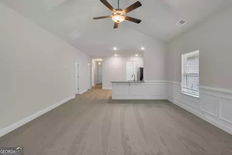 Living - 11963 Lovejoy Crossing Pl, Hampton, GA 30228 photo 2 of 2