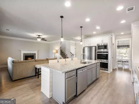Kitchen - 543 Calgary Downs Dr, Winder, GA 30680 photo 3 of 4