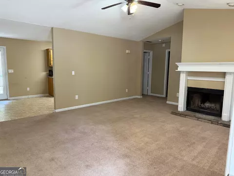 Living - 1220 N Hampton Dr, Hampton, GA 30228 photo 3 of 5