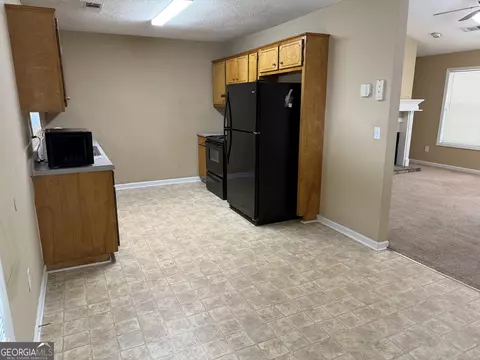 Kitchen - 1220 N Hampton Dr, Hampton, GA 30228 photo 2 of 3