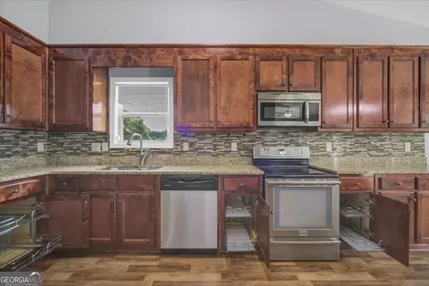 Kitchen - 1411 Silvergate Way, Winder, GA 30680 photo 3 of 3