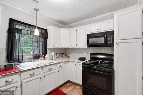 Kitchen - 225 Myrtle Dr, Roberta, GA 31078 photo 2 of 2