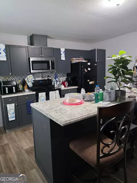 Kitchen - 405 Merritt Ave, Edison, GA 39846 photo 2 of 2