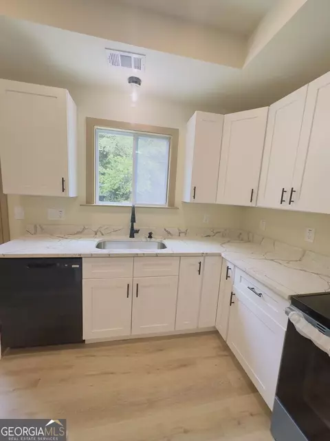 Kitchen - 1238 Highway 142 E, Covington, GA 30014 photo 3 of 4