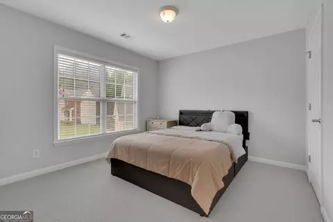 Bedroom - 923 Van Briggle Path NE, Sugar Hill, GA 30518 photo 2 of 6