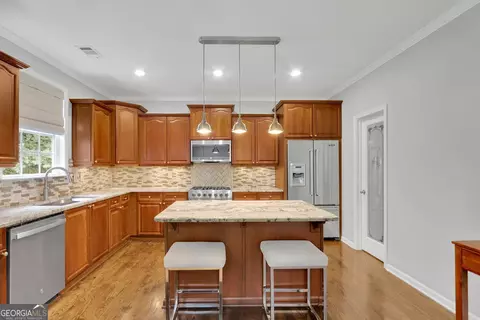 Kitchen - 923 Van Briggle Path NE, Sugar Hill, GA 30518 photo 2 of 4