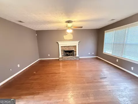 Living - 65 Montgomery Ct, Covington, GA 30016 photo 3 of 4