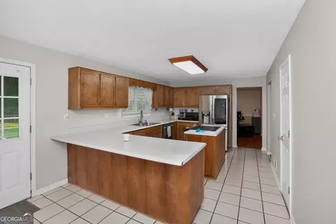 Kitchen - 304 Gresham Rd, Zebulon, GA 30295 photo 2 of 3
