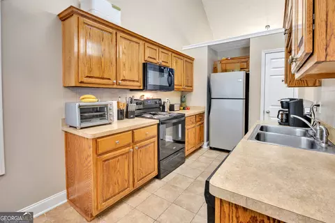 Kitchen - 200 Cedar Rd, Covington, GA 30016 photo 4 of 4