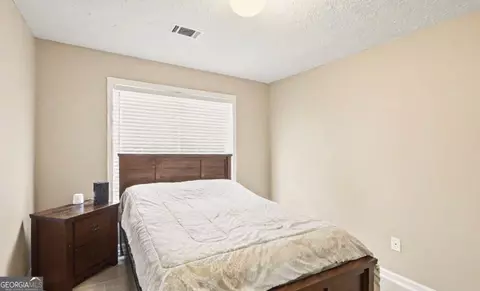 Bedroom - 2305 Sugarleaf Trl, Hampton, GA 30228 photo 6 of 9