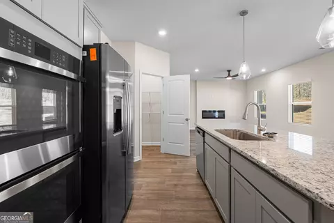 Kitchen - 370 Granary Walk, Covington, GA 30014 photo 2 of 4