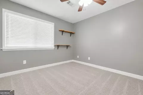 Bedroom - 122 E Knight Rd, Mcdonough, GA 30252 photo 6 of 12