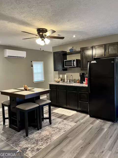 Kitchen - 122 E Knight Rd, Mcdonough, GA 30252 photo 1 of 7