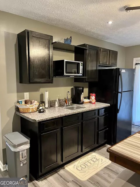 Kitchen - 122 E Knight Rd, Mcdonough, GA 30252 photo 2 of 7