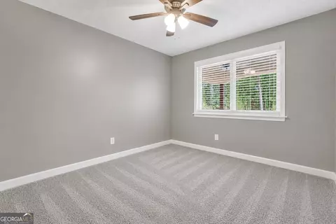 Bedroom - 122 E Knight Rd, Mcdonough, GA 30252 photo 8 of 12