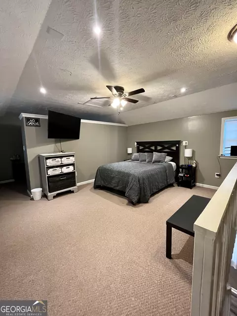 Bedroom - 122 E Knight Rd, Mcdonough, GA 30252 photo 2 of 12