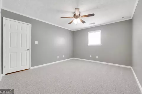 Bedroom - 122 E Knight Rd, Mcdonough, GA 30252 photo 3 of 12
