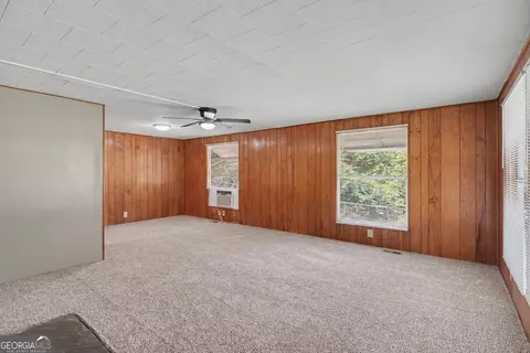 Living - 45 E James Cir, Hampton, GA 30228 photo 3 of 4