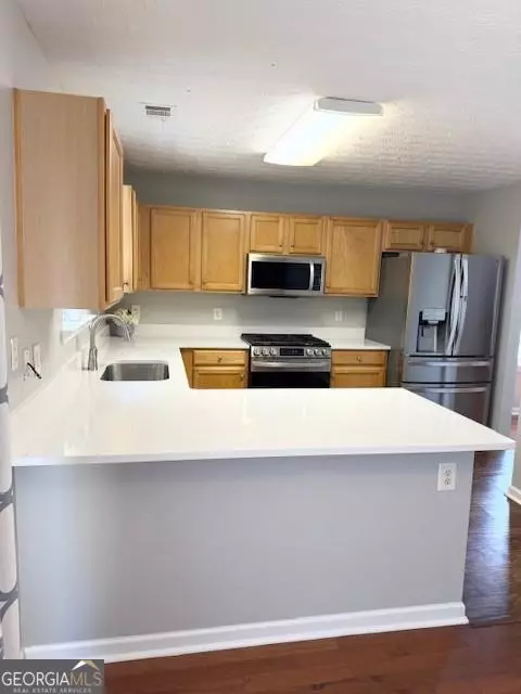 Kitchen - 411 Sugar Maple Ct, Canton, GA 30114 photo 2 of 4