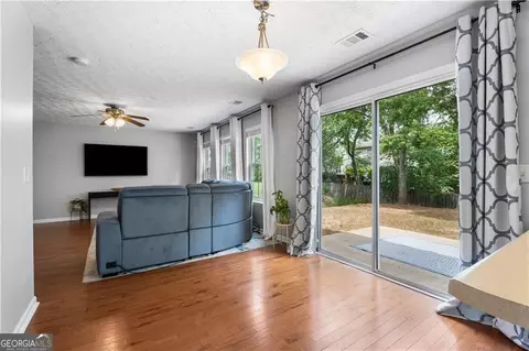 Living - 411 Sugar Maple Ct, Canton, GA 30114 photo 1 of 3