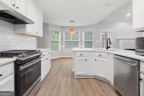 Kitchen - 101 Moss Pointe Dr, Mcdonough, GA 30253 photo 3 of 3