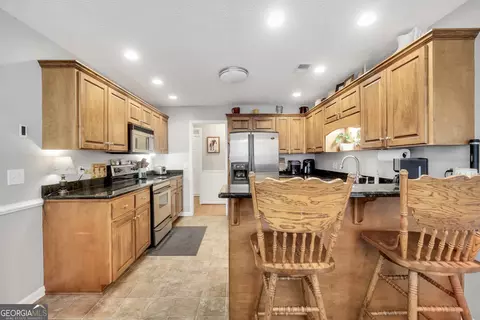 Kitchen - 95 Five Oaks Dr, Covington, GA 30014 photo 2 of 4