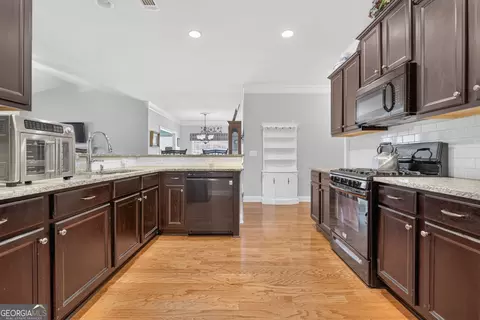 Kitchen - 835 Ideal Pl, Winder, GA 30680 photo 2 of 5